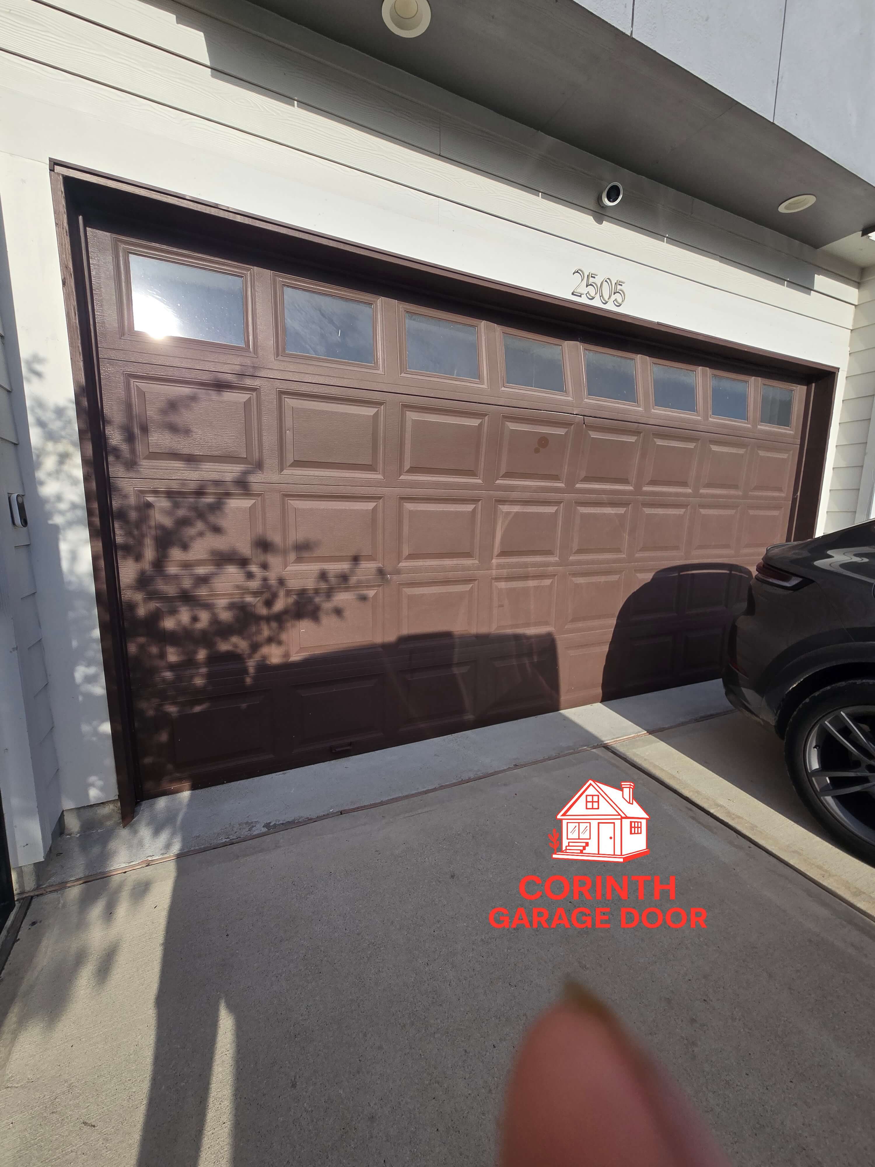 damaged-two-car-garage